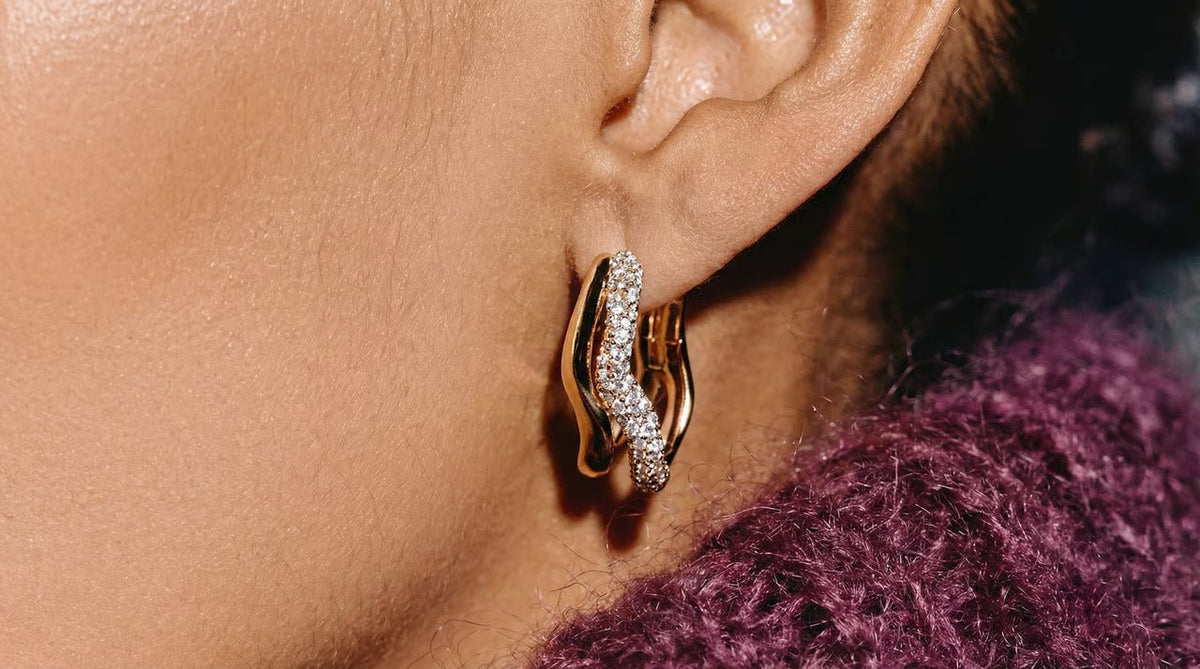 Waterproof gold earrings including hoops, studs and huggies by Monrich